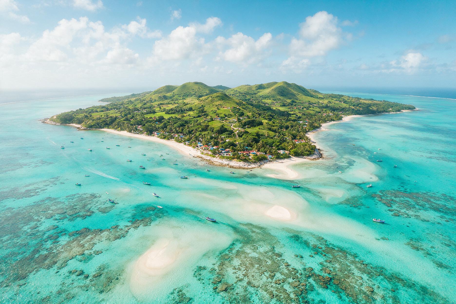 Aerial view of Rodrigues Island's shallow turquoise lagoon near Mauritius