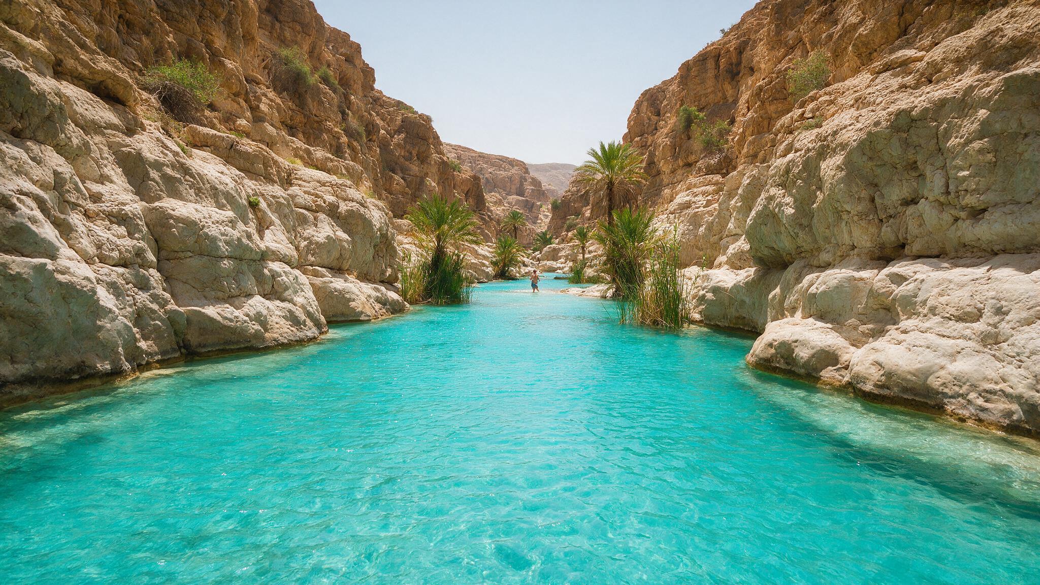 Turquoise pools of Wadi Shab canyon in Oman, a hidden hike near Tiwi on Oman's coast