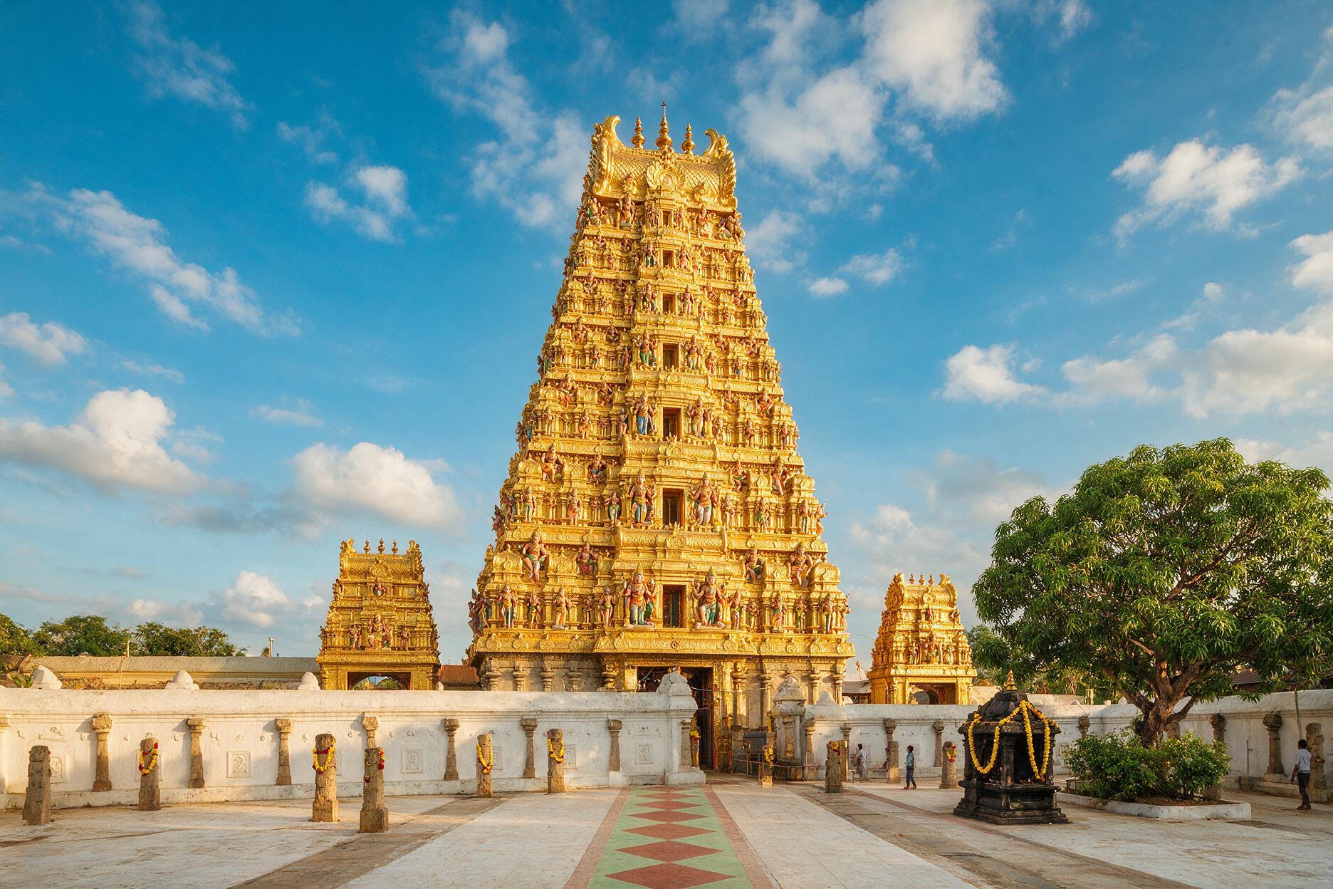 Golden gopuram tower of the Nallur Kandaswamy Kovil temple in Jaffna, Sri Lanka