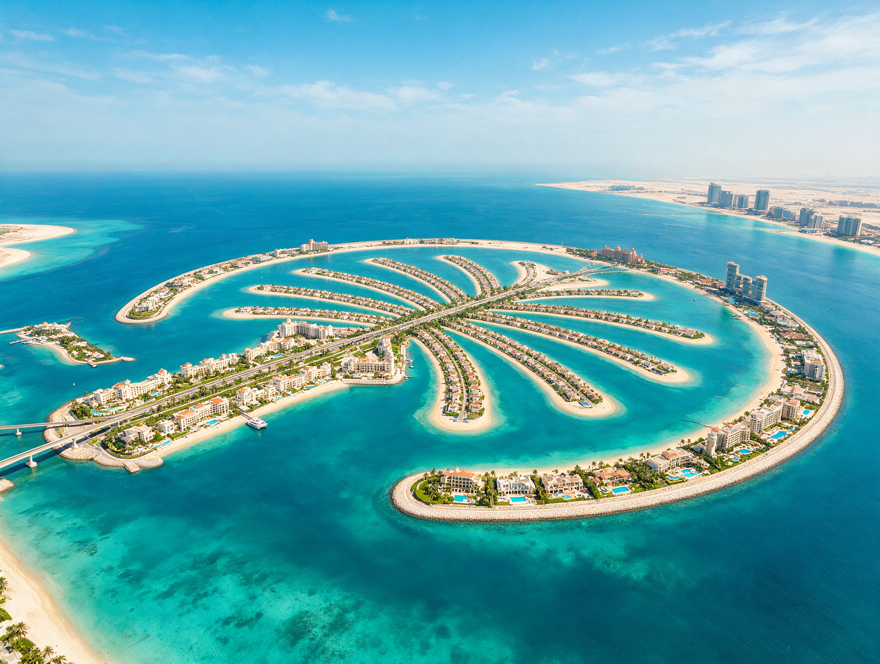 Aerial view of Palm Jumeirah man-made island surrounded by turquoise sea